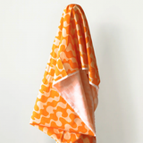 All Summer Long 100% Cotton Orange & Peach Wave Print 148 cm wide $29 pm